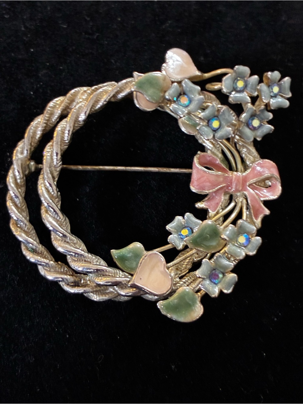 vintage EUC floral wreath brooch featuring pastel enameled flowers & Rhonestones